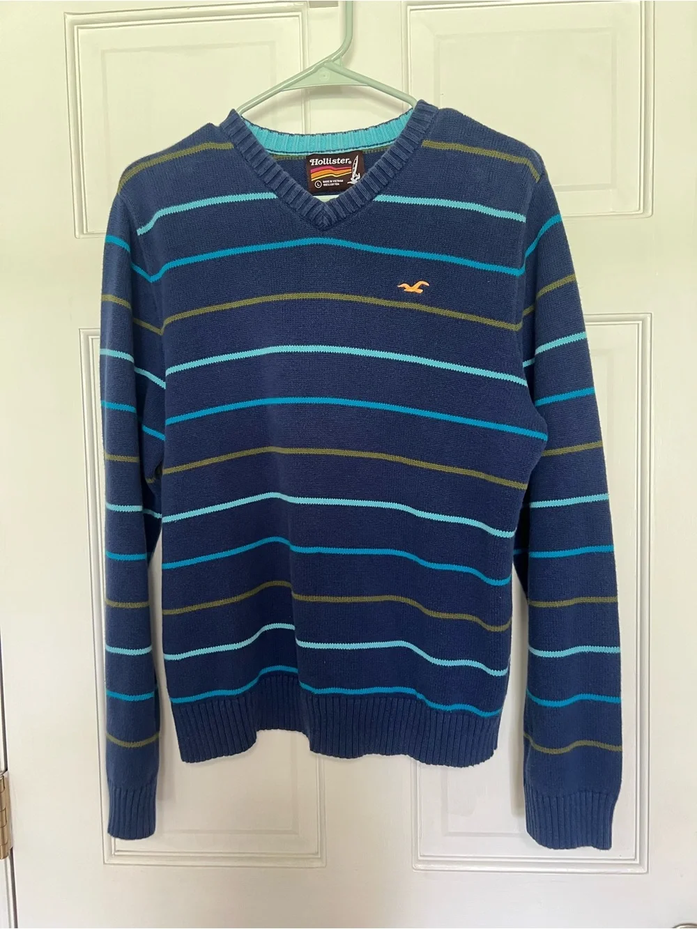 Vintage Holister Men’s Navy V-Neck Striped Sweater
